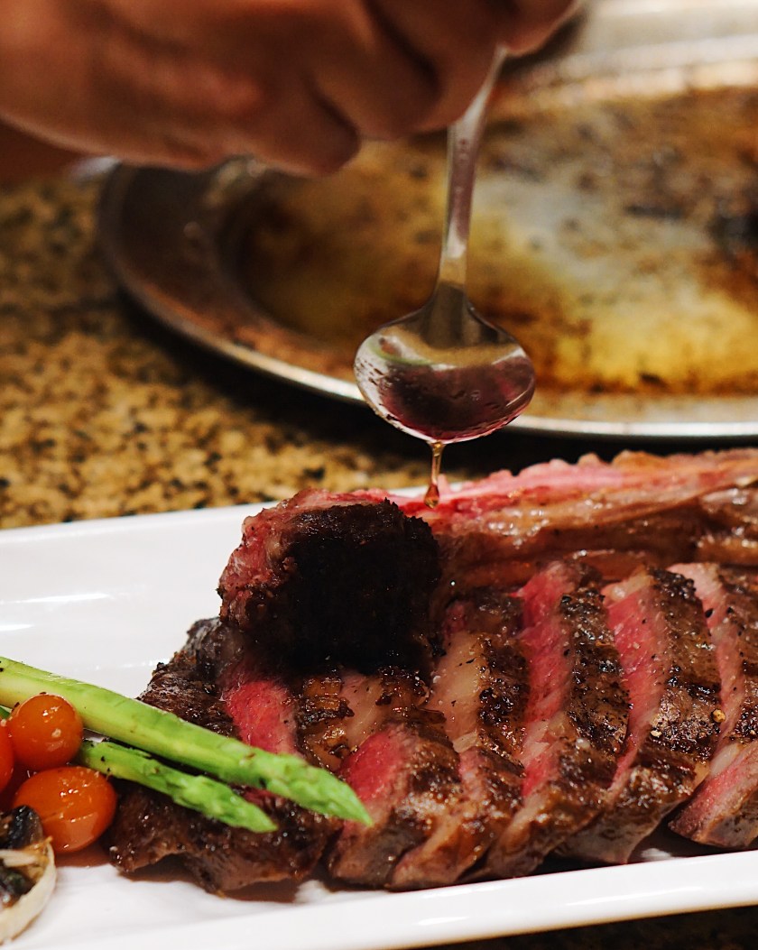 raw-beef-and-tomahawk-steak-at-the-fireplace-new-world-manila-bay