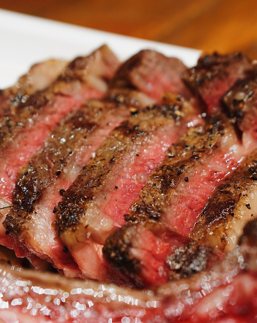 raw-beef-and-tomahawk-steak-at-the-fireplace-new-world-manila-bay