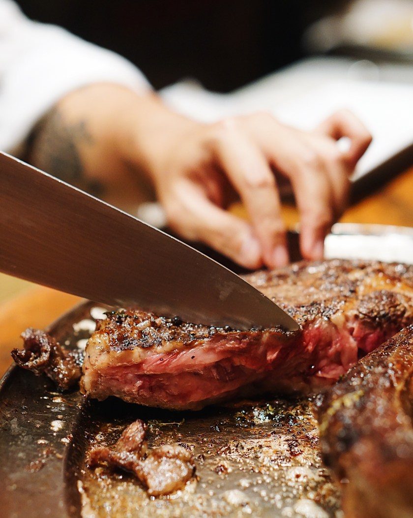 raw-beef-and-tomahawk-steak-at-the-fireplace-new-world-manila-bay