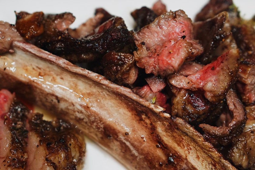 raw-beef-and-tomahawk-steak-at-the-fireplace-new-world-manila-bay